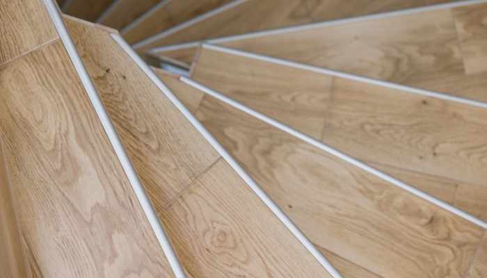 Spyral wooden staircase closeup. Interior design concept.